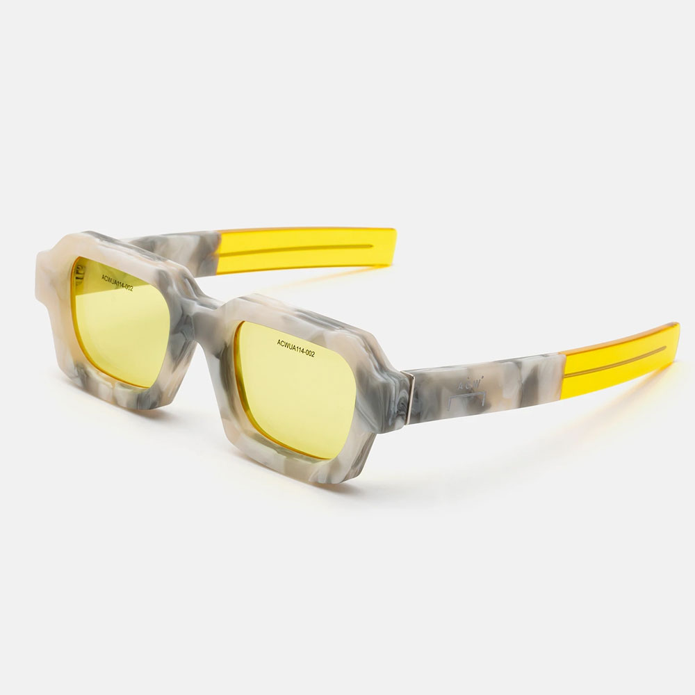 Textured White Marble Acetate Frame With Neon Yellow Tinted Lenses & Matching Temple Tips.
